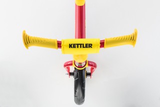 Balance bike handlebar with safety handles and handlebar padding